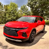 Red Chevrolet SUV after detailing